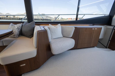 Luxurious interior of 2023 Princess S72 yacht with elegant seating and modern design.