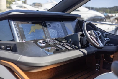 2023 Princess S72 yacht helm with advanced navigation displays and controls.