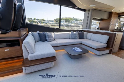 Luxurious interior of 2023 Princess S72 yacht with elegant seating and modern design.