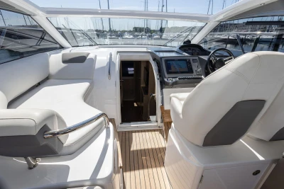 Luxurious 2017 Princess V40 yacht interior with helm, seating, and navigation equipment.
