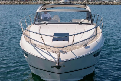 2017 Princess V40 yacht cruising on calm blue waters.