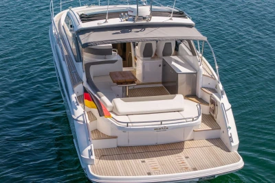 2017 Princess V40 yacht with spacious deck and seating, cruising on calm blue waters.
