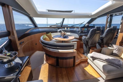 Luxurious interior of 2014 Princess S72 yacht with elegant seating and ocean view.