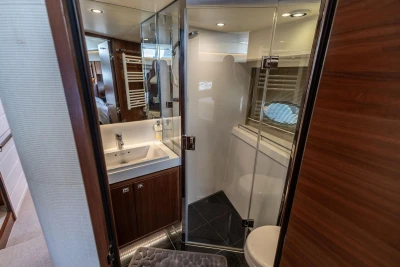 Luxurious bathroom interior on a 2014 Princess S72 yacht, featuring modern fixtures and elegant design.