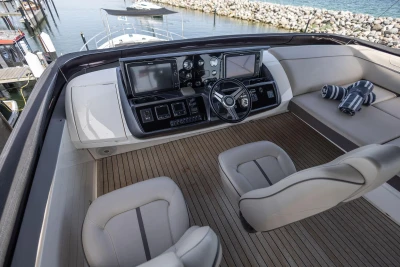 Luxurious 2014 Princess S72 yacht helm with modern controls and plush seating.