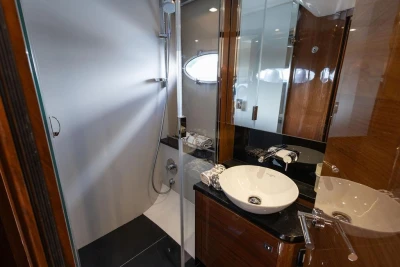 Luxurious bathroom in 2015 Princess V48 Open yacht with modern fixtures and elegant design.