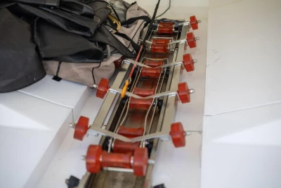 Storage compartment with equipment on a 2015 Princess V48 Open yacht.