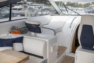 Luxurious interior of 2015 Princess V39 yacht with plush seating and modern design.