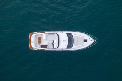 Aerial view of 2024 Princess F50 yacht on open water.