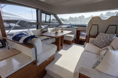 Luxurious interior of 2024 Princess F50 yacht with elegant seating and modern design.
