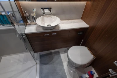 Luxurious bathroom in 2024 Princess F50 yacht with modern fixtures and elegant design.