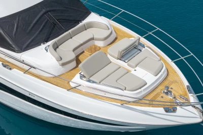 Luxurious 2025 Princess F65 yacht with elegant deck seating and sleek design.