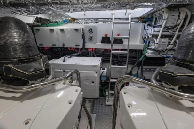 Engine room of 2025 Princess F65 yacht, featuring advanced equipment and control systems.