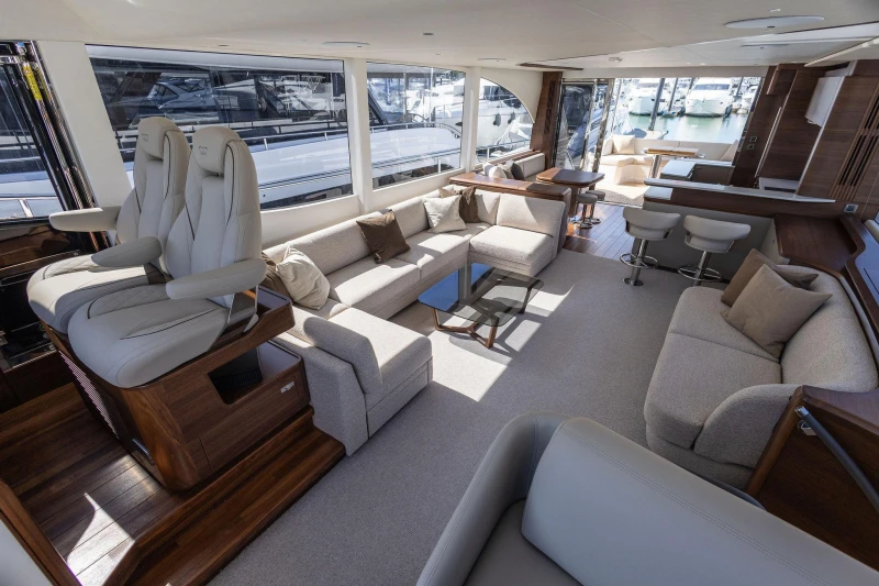 Luxurious interior of 2026 Princess Y72 yacht with elegant seating and modern design.