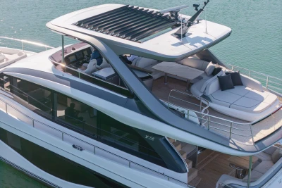 Luxurious 2026 Princess Y72 yacht with spacious deck and modern design on tranquil water.