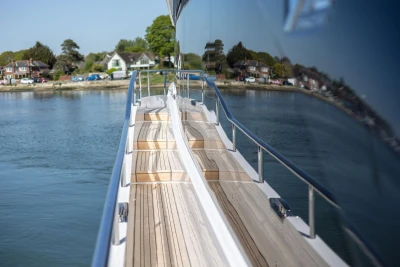 Luxurious Princess Y72 yacht deck with scenic waterfront view, 2026 model.