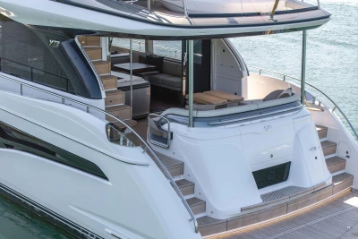 Luxurious 2026 Princess Y72 yacht with elegant deck and seating area.