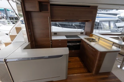 Luxurious kitchen interior of 2026 Princess Y72 yacht with modern appliances and sleek design.