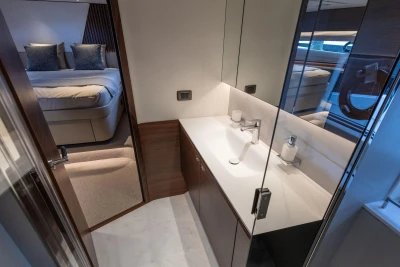 Luxurious bathroom and bedroom interior of 2026 Princess Y72 yacht.