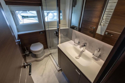 Luxurious bathroom interior of 2026 Princess Y72 yacht, featuring modern fixtures and elegant design.