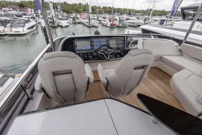 Luxurious helm of 2026 Princess Y72 yacht with modern navigation systems.
