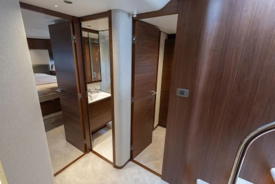 Luxurious interior of 2026 Princess F65 yacht featuring elegant wood finishes and modern design.