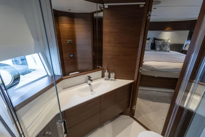 Luxurious bathroom and bedroom interior on 2026 Princess F65 yacht.