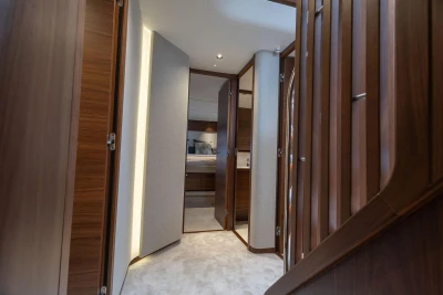 Luxurious interior of 2026 Princess F65 yacht with elegant wood finishes and modern design.
