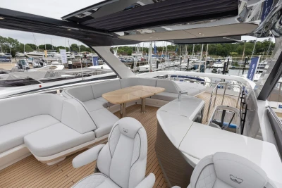 Luxurious 2026 Princess F65 yacht with spacious deck and elegant seating area.