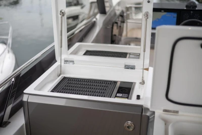 Outdoor grill on 2026 Princess F65 yacht, featuring sleek design and modern amenities.