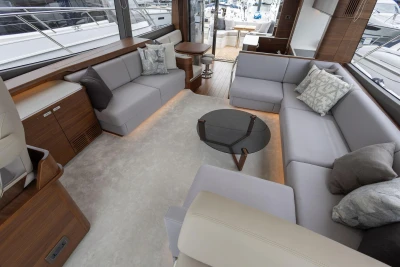Luxurious interior of 2026 Princess F65 yacht with modern seating and elegant decor.