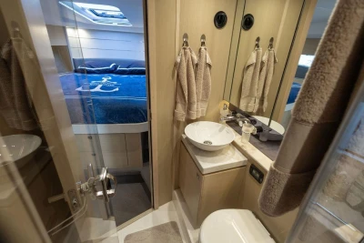 Luxurious 2018 Princess V40 yacht interior with modern bathroom and cozy bedroom.