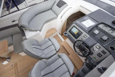 Luxurious 2018 Princess V40 yacht cockpit with modern controls and comfortable seating.