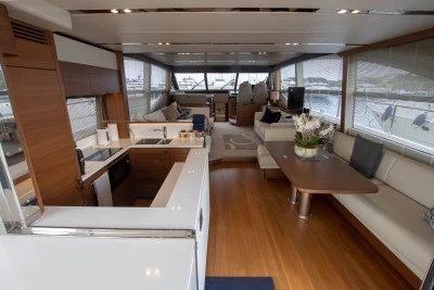Interior of a luxury yacht with modern kitchen and stylish living area.