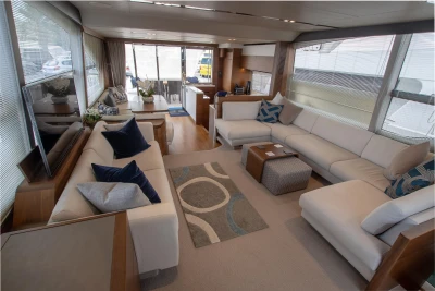 Interior of a luxury yacht with comfortable sofas and modern design.