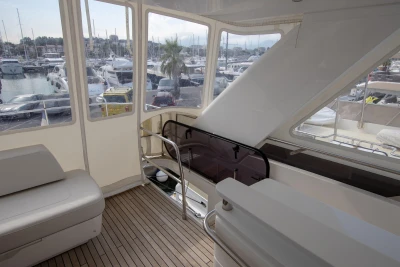 Interior of a luxury yacht overlooking the marina.
