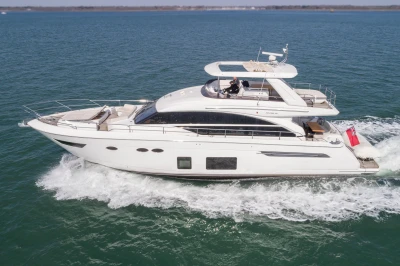 2016 Princess 68 luxury yacht cruising on the water.
