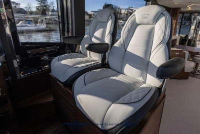 Luxurious seating inside the 2026 Princess S65 yacht, featuring elegant design and comfort.