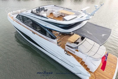 Luxurious 2026 Princess S65 yacht with spacious deck and elegant design on calm waters.