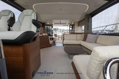 Luxurious interior of 2026 Princess S65 yacht with modern seating and elegant design.