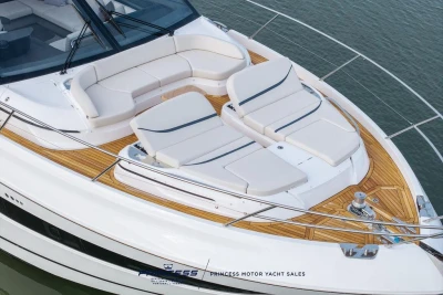 Luxurious 2026 Princess S65 yacht with elegant deck seating and sleek design.