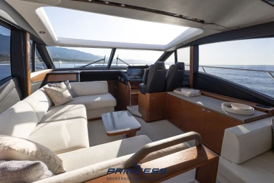 Luxurious interior of 2019 Princess S60 yacht with elegant seating and panoramic ocean views.