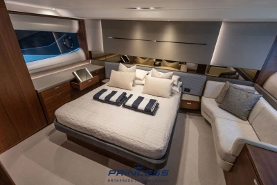 Luxurious interior of 2019 Princess S60 yacht with elegant bedroom design.