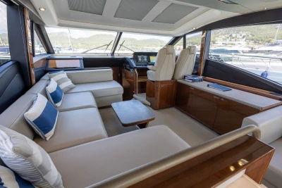 Luxurious interior of 2018 Princess S60 yacht with plush seating and elegant design.
