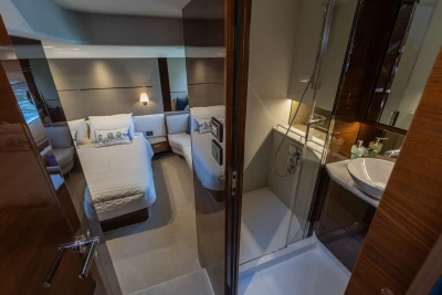Luxurious 2018 Princess S60 yacht interior with elegant bedroom and modern bathroom design.