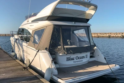 Luxury 2017 Princess 43 yacht docked, named 