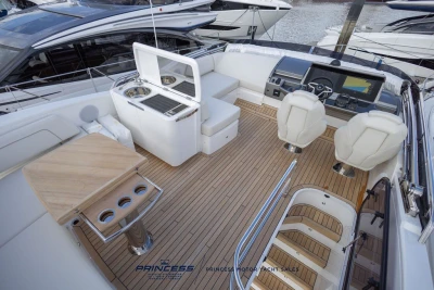Luxurious 2025 Princess F50 yacht interior with elegant seating and modern navigation system.