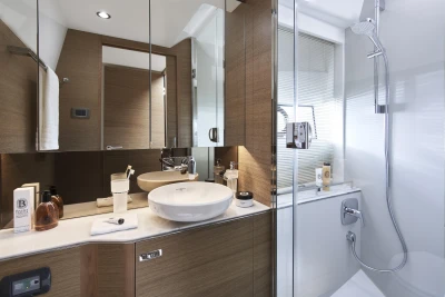 Luxurious bathroom in 2023 Princess F45 yacht with modern fixtures and elegant design.